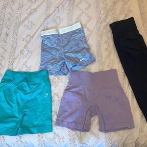 Gymshark, NIKE, and Amazon shorts and black Amazon leggings